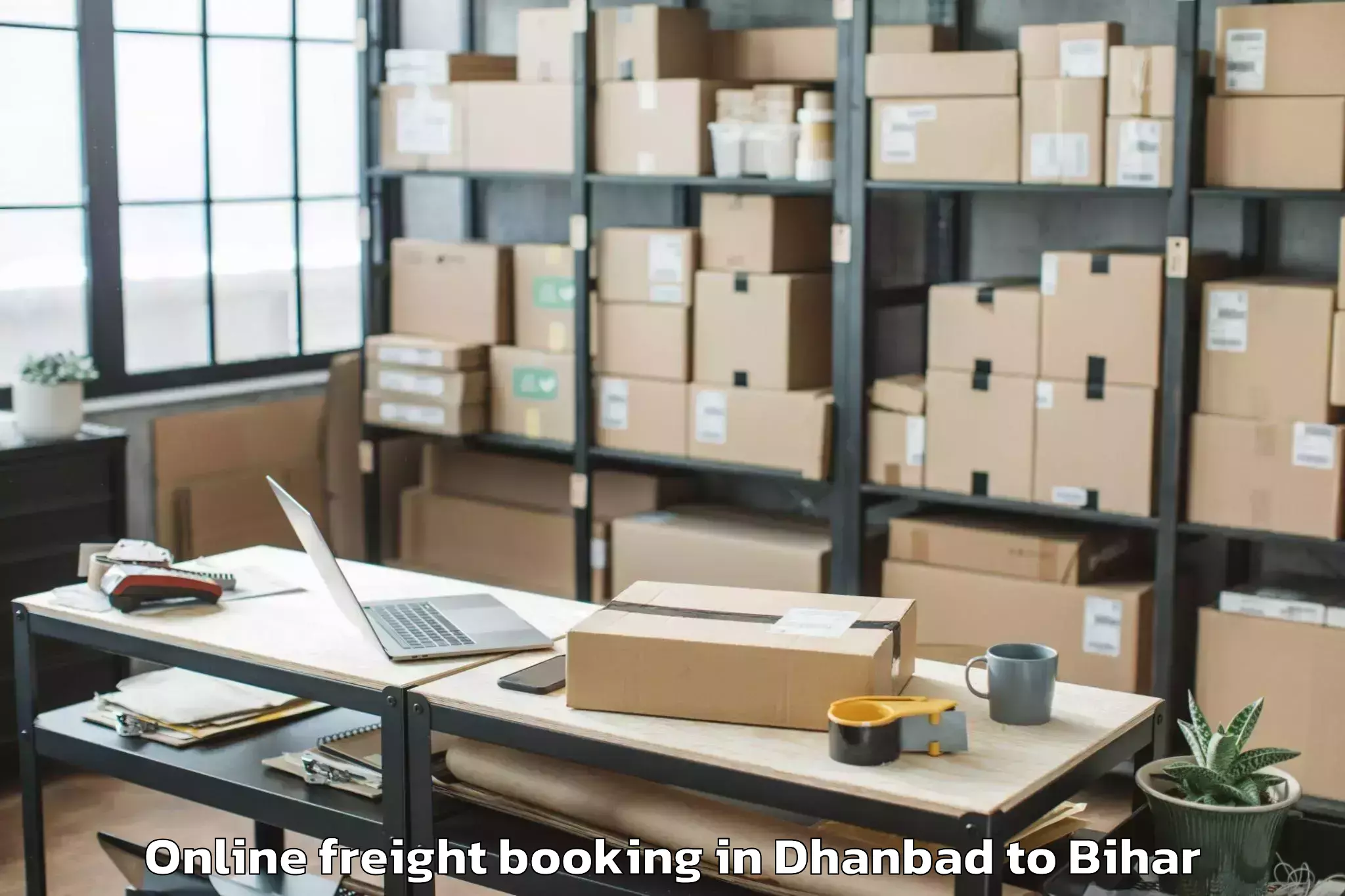 Dhanbad to Rajaun Online Freight Booking